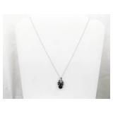 .925 Sterling Silver Diamond Accented Onyx Flower Pendant Necklace