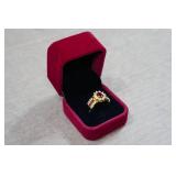 Gold Tone Ring with Red Stones - Size 8