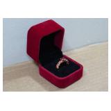 Rose Gold Tone Ring with Red Stones - Size 9.5