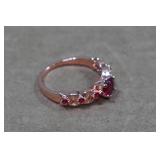 Rose Gold Tone Ring with Red Stones - Size 9.5