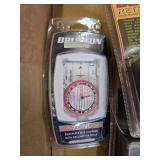 Spanish wine bottle, scope rail parts, fly fishing belt, Brunton compass, base plate map compass