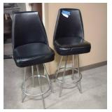 Pair of black leather stools