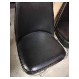Pair of black leather stools