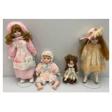 Misc. Collectible Porcelain Dools On Stands In Protective Bags