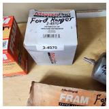 Assorted Automotive Filters and Parts including K&N High-Flow Air Filter, FRAM Oil Filters, and Wix Fuel Filter - See Pics