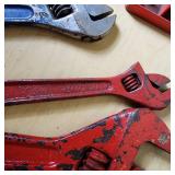 Lot of Assorted Hand Tools Including Adjustable Wrenches, Nippers, Socket Holders, and Pliers