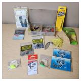 Fishing Tackle and Tools Including Pliers, Multi-tool, and Sinkers