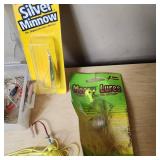 Fishing Tackle and Tools Including Pliers, Multi-tool, and Sinkers