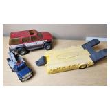 Tonka and Nylint Toy Vehicle Lot including Tonka Trailer, Nylint Fire Truck, and Tonka Bucket Truck