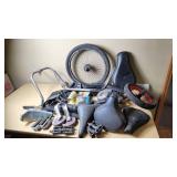 Mixed Bicycle Parts and Accessories including Kenda Bicycle Tube, Bell Brake Cable Set, Handlebars, and Pedals