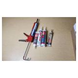 Caulking Gun and Sealant Lot including Red Devil Speed Demon, DAP Kwik Seal Plus, and Other Sealants