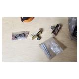 Assorted Hardware and Fasteners including Screws, Bolts, and Brackets