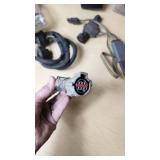 Assorted Vehicle Electrical Components and Accessories including Wiring Harnesses, Connectors, and Decorative Items