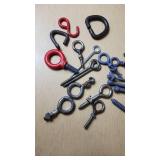 Eye bolts and hooks including red and black painted options, various sizes and types