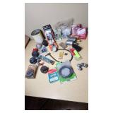 Assorted Automotive Parts Lot including Dorman Sending Unit Retainers, Autolite Spark Plugs, and Anti-Theft Door Lock Knobs