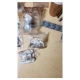 Various Hardware and Plumbing Parts including SharkBite Connectors, Springs, and Belwith Cabinet Hardware