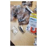 Various Hardware and Plumbing Parts including SharkBite Connectors, Springs, and Belwith Cabinet Hardware