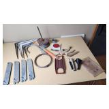 Assorted Hardware and Tools including Shelf Brackets, Wooden Dowels, and Cable Spool