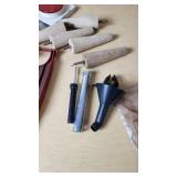 Assorted Hardware and Tools including Shelf Brackets, Wooden Dowels, and Cable Spool