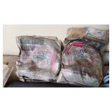 Assorted Construction and Plumbing Supplies including Squeegee, Fuel Tank Strap, Heating Tape, and Insulation Rolls