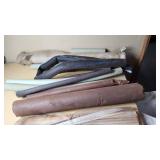 Assorted Construction and Plumbing Supplies including Squeegee, Fuel Tank Strap, Heating Tape, and Insulation Rolls