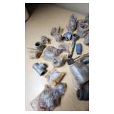 Lot of Plumbing Hardware and Fittings including Galvanized Nipples, Elbows, Valves, and Connectors
