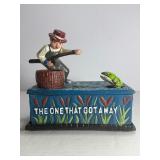 This classic piece is a must-have for collectors of mechanical banks and unique Americana decor! Featuring a charming fisherman theme, this cast iron bank offers both visual appeal and interactive fun