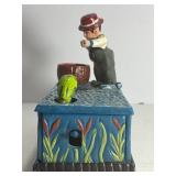 This classic piece is a must-have for collectors of mechanical banks and unique Americana decor! Featuring a charming fisherman theme, this cast iron bank offers both visual appeal and interactive fun