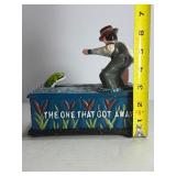 This classic piece is a must-have for collectors of mechanical banks and unique Americana decor! Featuring a charming fisherman theme, this cast iron bank offers both visual appeal and interactive fun