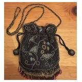 O - Beaded Drawstring Handbag with Floral Design and Fringe
