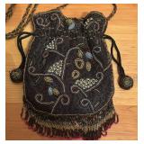O - Beaded Drawstring Handbag with Floral Design and Fringe