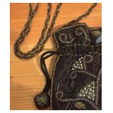 O - Beaded Drawstring Handbag with Floral Design and Fringe