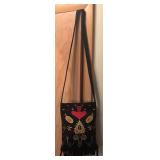 O - Black Handbag with Colorful Embroidered Floral Design and Fringe