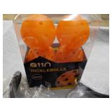 6 Pickle Balls and 4 Visors...