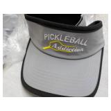 6 Pickle Balls and 4 Visors...