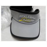 6 Pickle Balls and 4 Visors...