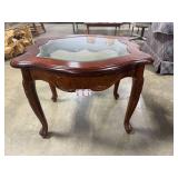 Wood and Glass Accent Table with Carved Details
