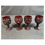 Collection of Vintage Ruby Red Glassware Including Goblets, Bowls, and Decanters