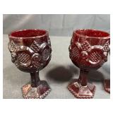 Collection of Vintage Ruby Red Glassware Including Goblets, Bowls, and Decanters