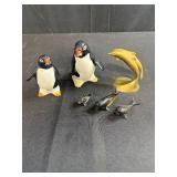 Collection of Animal Figurines - Enesco Penguins, Brass Dolphins, and Whale Miniatures