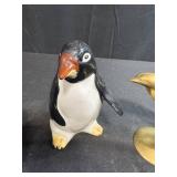 Collection of Animal Figurines - Enesco Penguins, Brass Dolphins, and Whale Miniatures