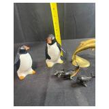 Collection of Animal Figurines - Enesco Penguins, Brass Dolphins, and Whale Miniatures