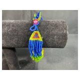 Collection of Woven Plastic Cuff Bracelets and 1 Beaded Bracelet