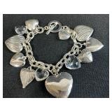 Collection of Bracelets Including Silver Tone Charm, Gold Tone Pearl Charm, Beaded, and Braided Styles