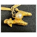 Collection of Bracelets Including Silver Tone Charm, Gold Tone Pearl Charm, Beaded, and Braided Styles