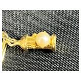 Collection of Bracelets Including Silver Tone Charm, Gold Tone Pearl Charm, Beaded, and Braided Styles