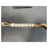 Collection of Bracelets Including Silver Tone Charm, Gold Tone Pearl Charm, Beaded, and Braided Styles