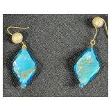 Assorted Costume Jewelry Lot: Bracelets, Earrings, and Charm Bracelet