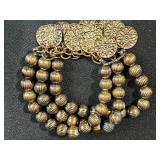 Assorted Costume Jewelry Lot: Bracelets, Earrings, and Charm Bracelet