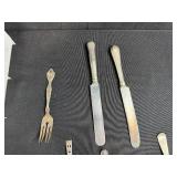 Large Lot of Assorted Vintage Flatware Including Spoons, Forks, and Knives
